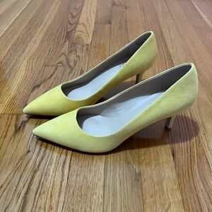 Yellow suede pumps